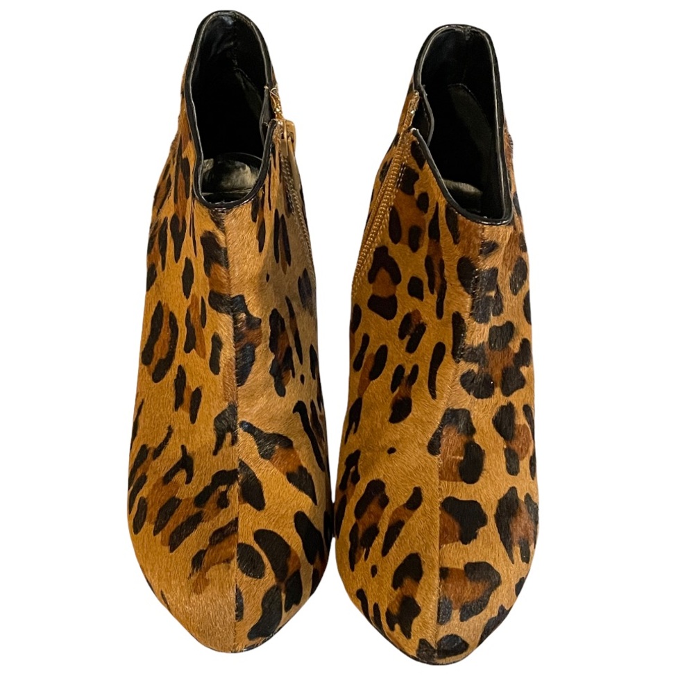 Women’s Genuine Cow Hair cheetah print zip up stiletto booties.